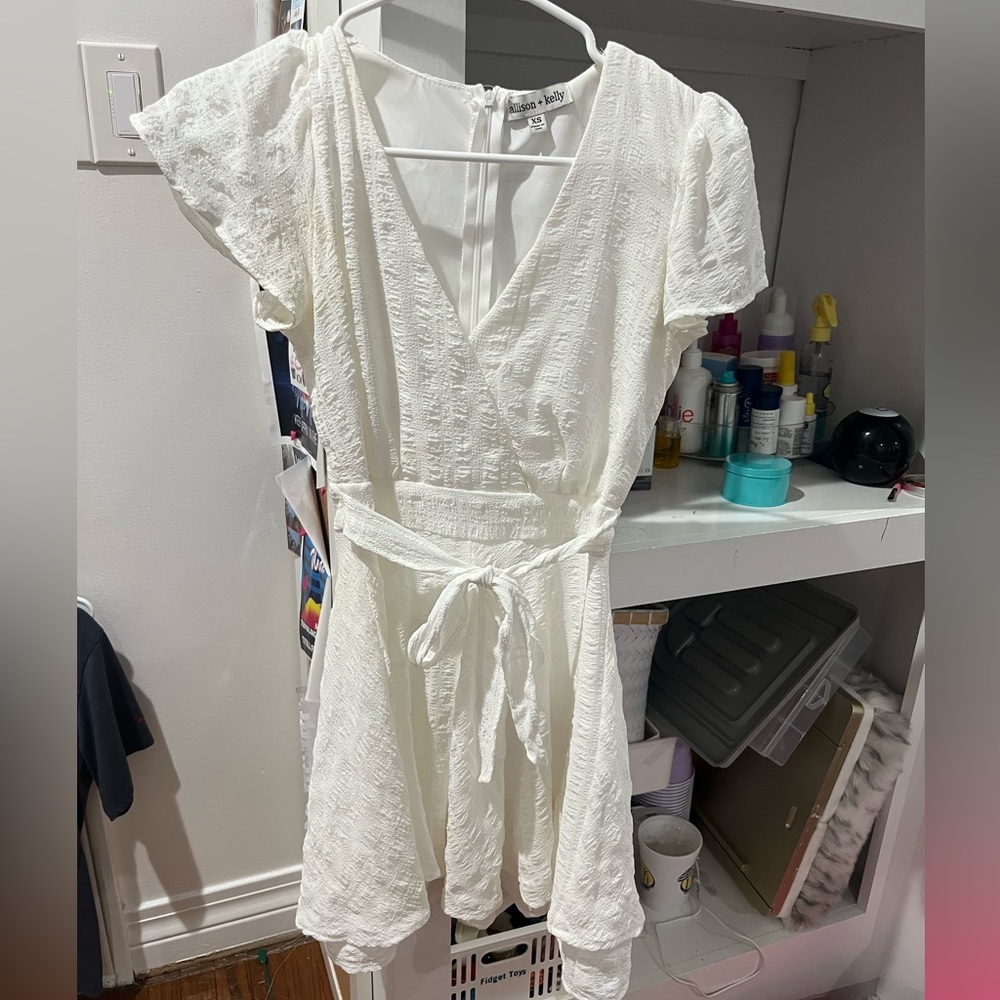 allison+kelly white low-cut dress. size xs. worn 1 time